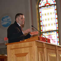 <p>Dutchess County Executive Marc Molinaro spoke to a group of residents during the MLK celebration.</p>
