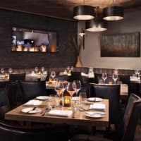 <p>Madison Kitchen in Larchmont ups the ambiance with a gas fireplace.</p>