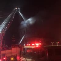 <p>As many as 50 firefighters from multiple agencies responded to Elm Street in New Rochelle to battle a three-alarm blaze.</p>