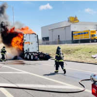 <p>Firefighters at the scene.</p>