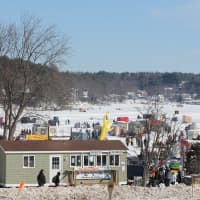 <p>Thousands were at Lake Winnipesaukee in New Hampshire for the Meredith Rotary Club Ice Fishing Derby.</p>