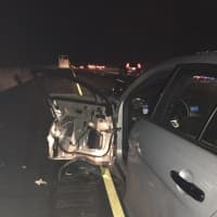 <p>A car driven by a drunken driver slammed into a State Police cruiser on I-95 at the scene of a broken down bus.</p>