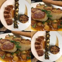 <p>Kitchen Sink&#x27;s duck breast with brussel sprouts or seared scallops with panisse.</p>