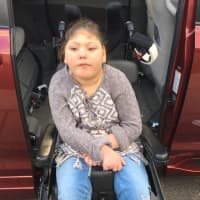 <p>Makayla rolls out of her new van.</p>