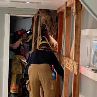 <p>Once the driver and passenger were safely removed, crews carried out structural safety measures and winched the car from the building, authorities said.</p>