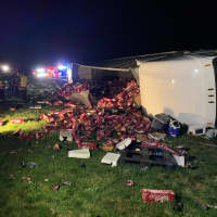 <p>The tractor-trailer carrying the pallets crashed and flipped over in the westbound lanes just before exit 3, the Stewartsville Volunteer Fire Company said.</p>