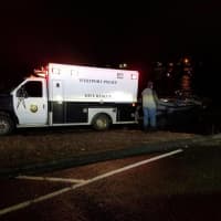 <p>The Westport Police Department&#x27;s Dive Rescue team responds to search the waters of the Saugatuck River for a couple whose car went into the water late Saturday.</p>