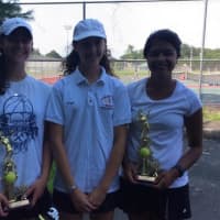 <p>Girls show trophies they won at a USTA Tennis Tournament conducted by Slammer Tennis World of Norwalk.</p>