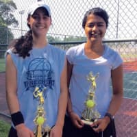 <p>Girls show trophies they won at a USTA tournament conducted by Slammer Tennis World in Norwalk.</p>