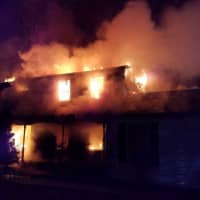 <p>Lake Carmel firefighters worked for hours to knock down a large fire that destroyed a home on Westleigh Road.</p>