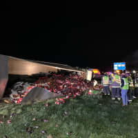 <p>The driver was able to escape from the overturned truck without injury, authorities said.</p>