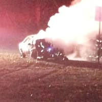 <p>A car fire closed down West Maple Avenue for more than hour as firefighters worked to douse the flames.</p>