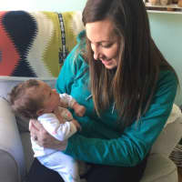 <p>Katie Belthoff McCarten and her baby girl.</p>