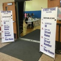 <p>Voters begin to head to the polls Tuesday morning at Madison Middle School in Trumbull.</p>