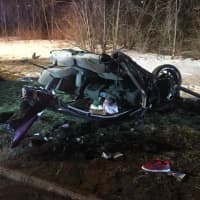 <p>The driver of this stolen Honda Civic was severely injured in a crash on Route 25 in Newtown, state police said.</p>