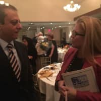 <p>Maureen Porette, a possible candidate for Rockland County Executive, speaks to Preet Bharara, former U.S. attorney for the Southern District of New York.</p>