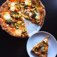 <p>Pizza Capricciosa; Tomato, Mozzarella, Mushroom, Artichoke &amp; Olive at Tarry Lodge in Westport.</p>