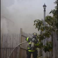 <p>The fire in a home at 30 West Rocks Road produced smoky conditions.</p>