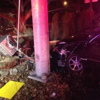 <p>Two people were injured following a car crash Sunday at the intersection of New Hempstead Road and Summit Park Road.</p>