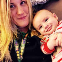 <p>Heather Reynolds and baby Axel</p>