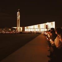 <p>Students at Sacred Heart University hold a candlelight vigil Sunday night after the death of a classmate.</p>