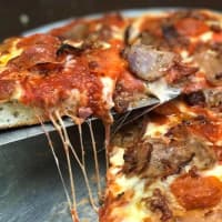 <p>Meatlovers pizza comes with over a dozen mozzarella sticks stuffed in the crust at Brother Bruno&#x27;s in Wayne.</p>