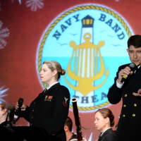 <p>Christopher Vlangas performing with the Navy band.</p>
