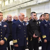 <p>Coast Guard officials and others gather for a service to celebrate the life of Nathan B. &quot;Nate&quot; Bruckenthal, a former Ridgefield resident who died in Iraq in 2004.</p>