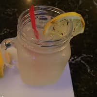 <p>A cherry wood smoked lemonade with a brûlée lemon wedge at Southbound BBQ.</p>