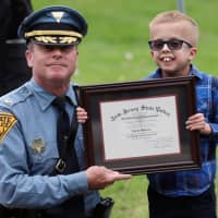 <p>A Warren County 10-year-old battling a rare brain disorder was appointed as an honorary New Jersey state trooper.</p>