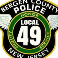 <p>Union supporters are adorning their Facebook pages with this modified version of the former Bergen County Police Department shield.</p>