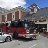 <p>Firefighters on scene of a car crash into the Riverside Bank in the Village of Fishkill.</p>