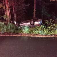 <p>A vehicle rolled over early Sunday on North Mountain Road in Brookfield.</p>