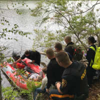 <p>Emergency crews from Morris County ventured deep into the woods and crossed the Boonton Reservoir to rescue an injured hiker Monday afternoon.</p>
