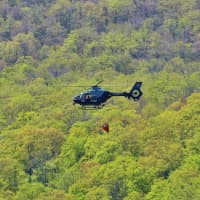 <p>A helicopter was used to douse the brush fire in Western Massachusetts.</p>
