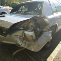 <p>A woman charged with drunken driving slammed into a Connecticut state police cruiser on I-395 south overnight.</p>