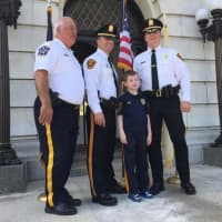 <p>Bergen County Sheriff Michael Saudino, far left, stands next to his son, an officer in Haworth.</p>