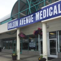 <p>Federal and local authorities were seen investigating Dolson Avenue Medical on Wednesday.</p>