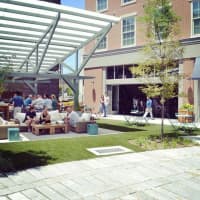 <p>The outdoor space at Harlan Publick in Norwalk.</p>