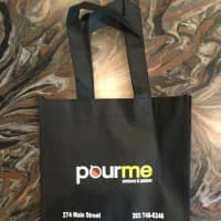 <p>Pour Me Coffee &amp; Wine Cafe will offer free tote bags for to go orders on Friday — while supplies last.</p>