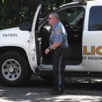 <p>Patrol Officer Sean Amoruso transported the casing to headquarters for examination.</p>