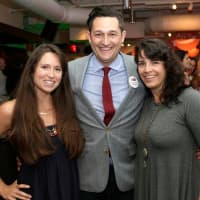 <p>Community Plates Executive Director Kevin Mullins (center) stands with Susan Keiser-Smith (right) and Lauren Rudzis (left).</p>