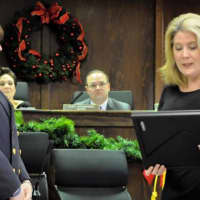<p>New Jersey Assemblywoman Holly Shepisi presents Kellie Goodell with a resolution on behalf of the state Legislature.</p>