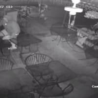 <p>Surveillance cameras capture the burglar entering Rowayton Pizza.</p>