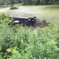 <p>Two good Samaritans and an off-duty officer came to the rescue of a teen driver whose Jeep went off the road and ended up on its side in a pond in northern Danbury near the New Fairfield border.</p>