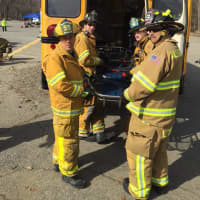 <p>Allendale and Ramsey firefighters work together.</p>