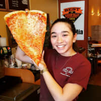 <p>Giant slices are on the menu at Pizza Mia in Newburgh.</p>