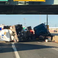 <p>A rolled over tractor-trailer blocked I-95 north between Exits 27 and 27A in Bridgeport on Sunday evening.</p>