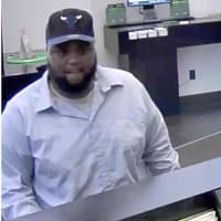 <p>A tall heavily built man with a scruffy beard robbed the TD Bank in Westport.</p>