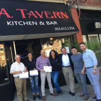<p>Mayor Joe Ganim, third from right, was on hand as L.A. Tavern held its grand opening in Bridgeport this week.</p>